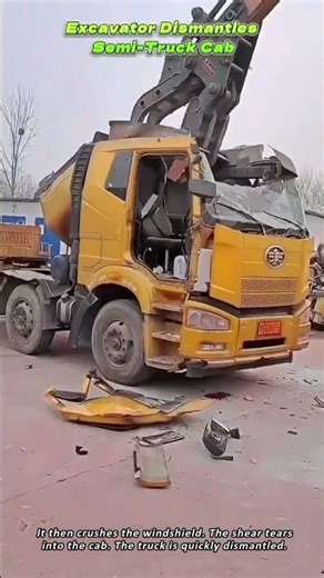 Excavator Dismantles Semi Truck Cab