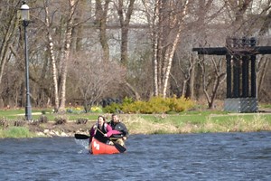 Braving Fierce Winds, Canoeists Race the RiverRun