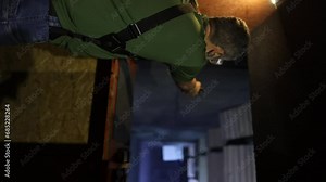 Detail view of shooter holding gun and training tactical shooting, close up. Shooting range Stock Video