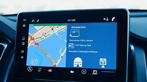 Download A close-up of a car's dashboard navigation system, highlighting advanced GPS technology. for free