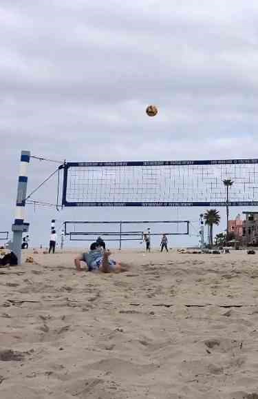 Epic Beach Volleyball Rally with a Stunning Save