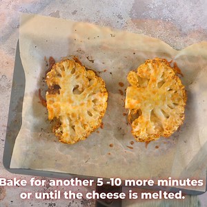 Turn Cauliflower into a Cheesy Delight! Try our Cheesy Cauliflower Steak for a mouthwatering twist. Save the Recipe: https://www.lowcarbspark.com/cauliflower-steak/ | Low Carb Spark