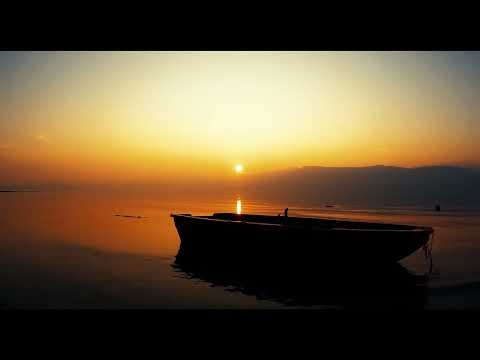 Peaceful Flowing Water Lapping Against Boat | The SonoVerse