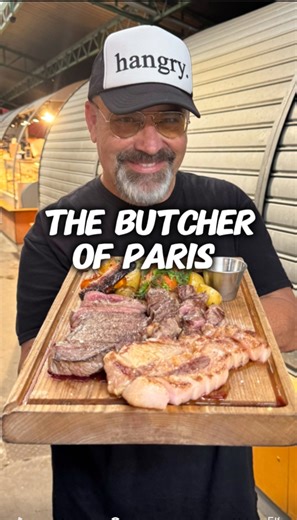 The Butcher of Paris, located at 39 Rue de Bretagne, 75003 Paris, sits right by the historic Marché des Enfants Rouges, the city’s oldest covered market dating back to 1615. Known for its rustic charm and emphasis on quality meats, this spot serves generous cuts cooked to perfection, paired with seasonal vegetables and a punchy chimichurri sauce. To start, guests are greeted with huge mounds of rich butter and excellent sourdough bread, a signature touch that sets the tone for the meal. With its