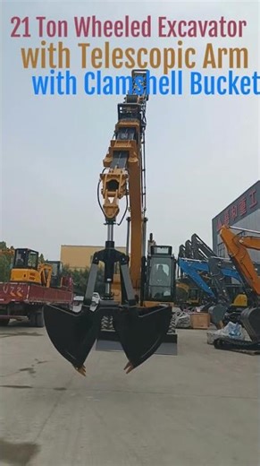 21 T Wheel Digger + Clamshell bucket #machinerychannel #excavator