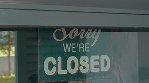 Switching a cafe sign to open - Free Stock Video