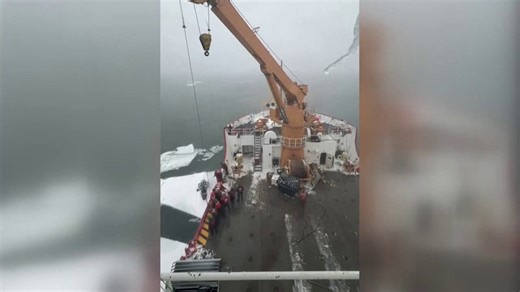 Watch: Coast Guard rescues snowmobiler stuck on ice near Mackinac Island