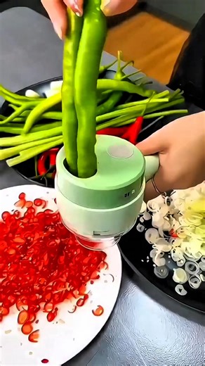 Sanvero | Home & Lifestyle on Instagram: "🧄 Electric Mini Vegetable & Onion Chopper ⚡ One-touch instant chopping 🥬 Perfect for green onions, garlic, chili, onion, herbs & vegetables 🔪 Fast, even and effortless cutting 🧼 Easy to disassemble & clean 🏠 Saves time in your kitchen No more knife mess! This electric mini chopper slices green onions, garlic, peppers and vegetables in seconds. Perfect results every time with zero effort! You can check out the produ