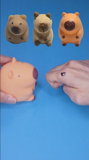 Capybara eating marshmallow emoji