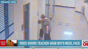 Teacher grabs kindergartner by neck