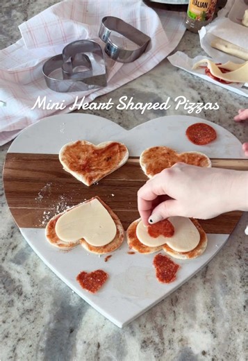 Mini Pastry Heart Pizzas for Valentine’s Night 🍕❤️ We made these adorable heart shaped pizzas together & it was pure joy! Messy hands, big laughs, & the happiest little helpers. 🥰 They’re SO easy to make & instantly turn dinner into something fun for everyone. Perfect for a quick family dinner, a cozy Valentine’s night in, or even a cute Galentine’s get together 💌 Save this for later you’re going to want to make these again & again 💕🍕 . . . . . #heartshapedpizza #valentinesday #valentinesid