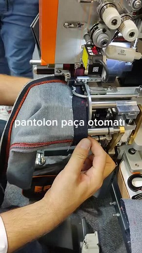 Sewing Machine in Action: Denim Fabric Close-Up