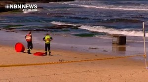 Swimmers at Newcastle Beach were forced off the sand today after a mysterious drum washed ashore, just after midday. Originally thought to be full of hydrochloric acid, hazmat crews later discovered it to be a tank of oil. | NBN Television