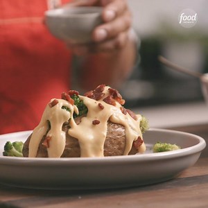 A cheese, bacon and broccoli LOADED Baked Potato all made in the Instant Pot! 🥓🧀🥦 Catch up on the full episode here: http://bit.ly/2Rbk2qf | Food Network