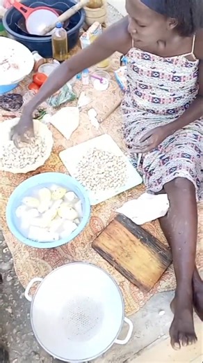 African village mum making Baobab Candy for her family