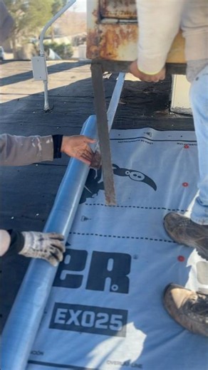 This is how roofers install underlayment underneath an old swamp cooler! 🏡 #roofing #construction