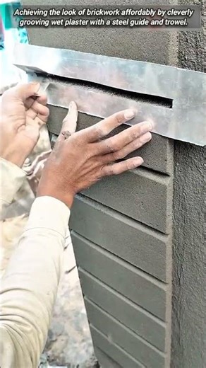 Plastering trick creates perfect faux brick wall texture design.