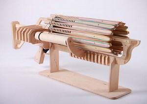 Rubber Band Machine Gun Shoots 14 Bands A Second (video)