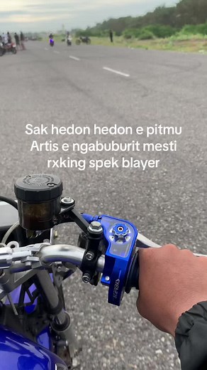 Riding a Blue Motorcycle: A Daytime Adventure