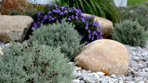 Upgrade Your Yard With HGTV's Genius Fake Rock DIY - House Digest