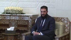 Iraqi security chief meets Syria's rebel leader in Damascus