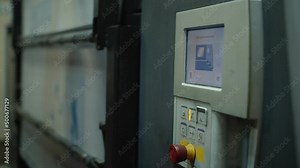 High speed labeling machine in industrial factory. Machine for sticker on product in manufacture. Flexible packaging.