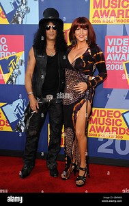 Slash and wife Perla Ferrar arrive for the MTV Video Music Awards 2008, at Paramount Studios, Hollywood, Los Angeles, California Stock Photo - Alamy