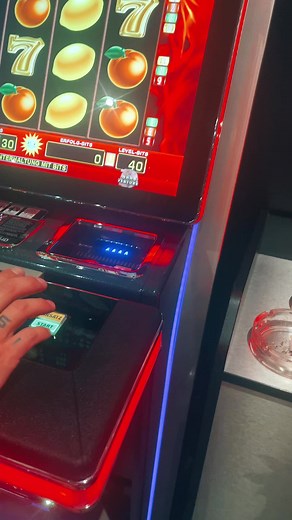 Exciting Slot Machine Gameplay in a Casino