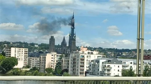 Horror fire at iconic French cathedral as vids show flames rise from spire