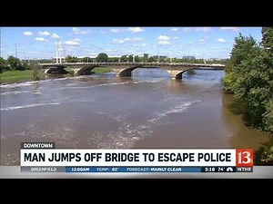 Man jumps off bridge to escape police