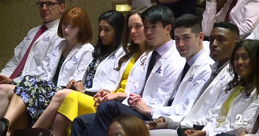 Johns Hopkins presented students with white coats to symbolize transition