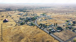 4k Aerial drone video footage of the abandoned, famous ghost town Shaniko in Central Oregon in a desert area. Captured during fall season.