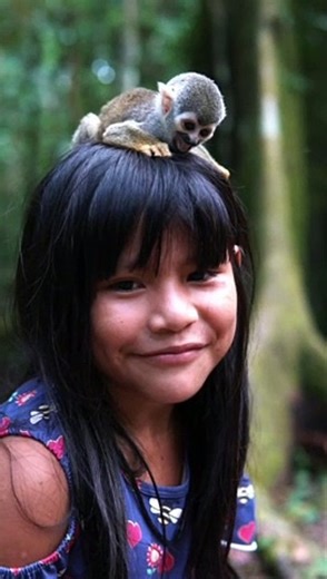 Indigenous Girl And Her Monkey