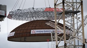 World’s largest crane ‘Big Carl’ lifts reactor dome into place at Hinkley Point C
