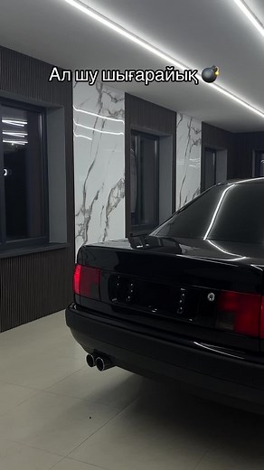 Luxury Audi Sedan Showcased in Modern Showroom