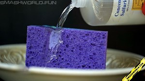 Acid on sponge slow motion