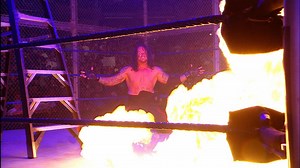 The Undertaker chokeslams Edge off a ladder through the ring: SummerSlam 2008