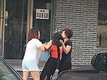 Woman in China is savagely beaten and stripped by two women