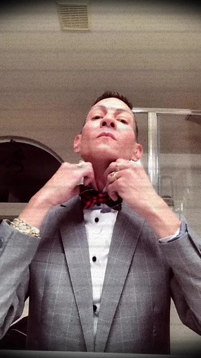 Peewee Herman's Stylish Look in Formal Setting