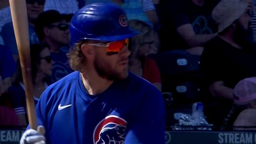 Patrick Wisdom hits a two-run single to center field