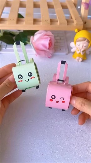 HerCraftNest | 🧳✨ DIY Mini Suitcase with Paper! Turn simple craft paper into a cute little suitcase—perfect for storing tiny treasures, gifting, or just... | Instagram