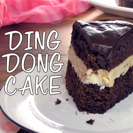 This Copycat Hostess Ding Dong Cake recipe is a rich, decadent chocolate cake, with a creamy filling and chocolate ganache spread over the top! So easy, you’ll love it! https://www.shugarysweets.com/ding-dong-cake/ | Shugary Sweets