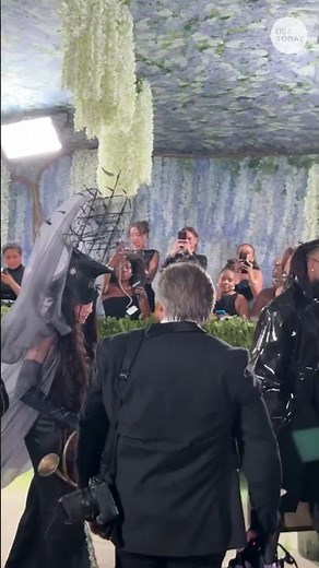 Madonna enchants in dark enchantress look on the Met Gala carpet