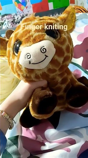 finger knitting a scarf for my stuffed animal crocheting knitting