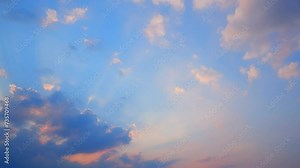 4K : Sunset sky time lapse : Timelapse footage captures the beauty of the sunset sky adorned with vibrant hues. Majestic clouds dance across the horizon, painting a picture of tranquility.