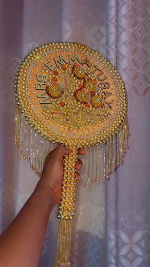 Slay ya day with elegance in hand ✨ #BridalFan #SaloneBride #HandmadeWithLove#madeinsierraleone