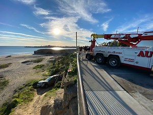 See: Car Drives Off Cliff, Occupants Rescued