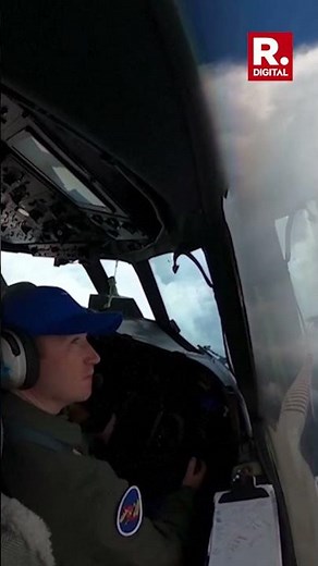 Dramatic View of Hurricane Erin's Eye as Planes Fly Through Powerful Storm