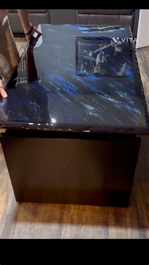 1.2K views · 15 reactions | This beautiful dragon blue coffee table also raises up to tv tray height and has a soft pneumatic close. This piece is available for purchase just in time for the Holidays! #daviscustomcountertops #epoxy #epoxyresin #epoxyresinart | Davis Custom Countertops and More | Facebook