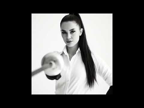Women's sword duel in the white room